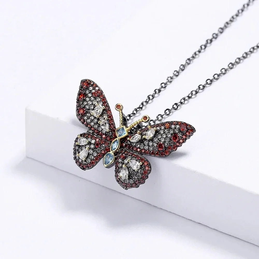 Gunmetal Gold Red CZ Butterfly Pendant